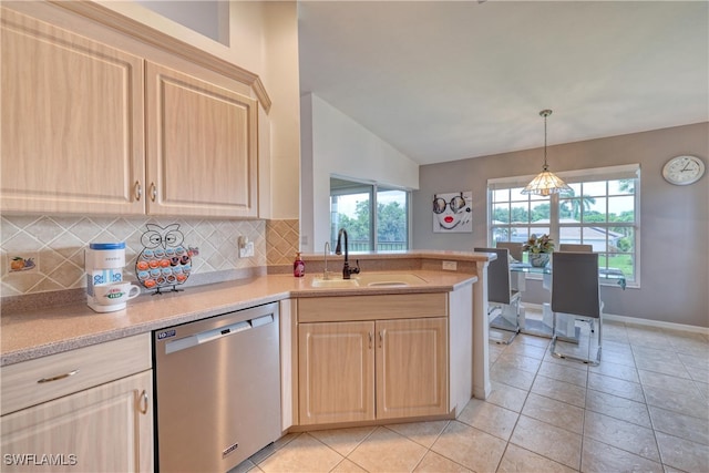 14561 Glen Cove Dr Unit 904, Fort Myers, FL 33919 - kitchen with stainless steel dishwasher, light brown cabinetry, a sink, light countertops, and decorative backsplash