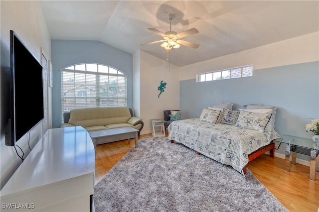 14561 Glen Cove Dr Unit 904, Fort Myers, FL 33919 - bedroom featuring lofted ceiling, wood finished floors, baseboards, and ceiling fan