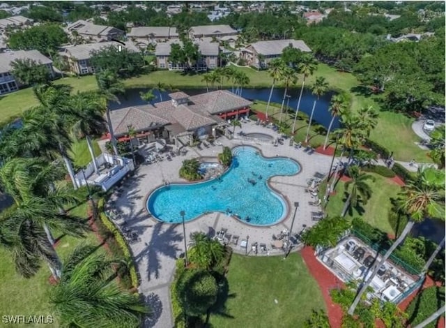 14561 Glen Cove Dr Unit 904, Fort Myers, FL 33919 - drone / aerial view of a pool area and a nearby body of water
