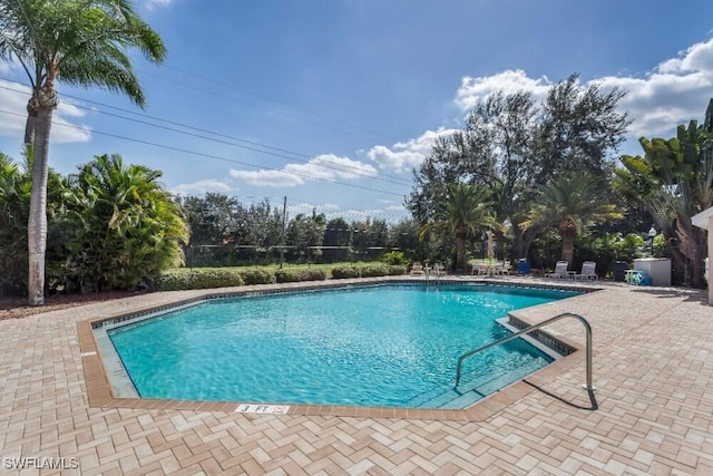14561 Glen Cove Dr Unit 904, Fort Myers, FL 33919 - community pool featuring a patio area
