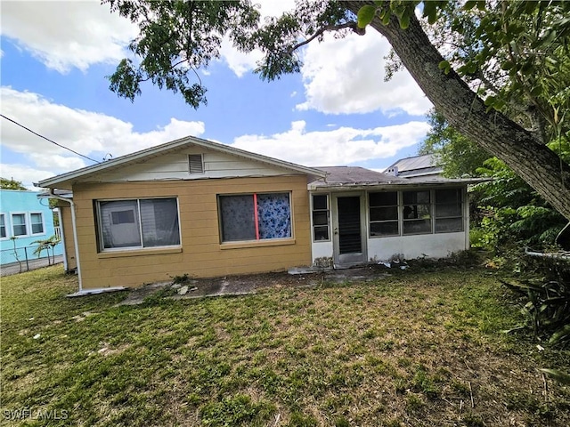 1112 Evanston St, Sebring, FL 33870 - view of front of property featuring a sunroom