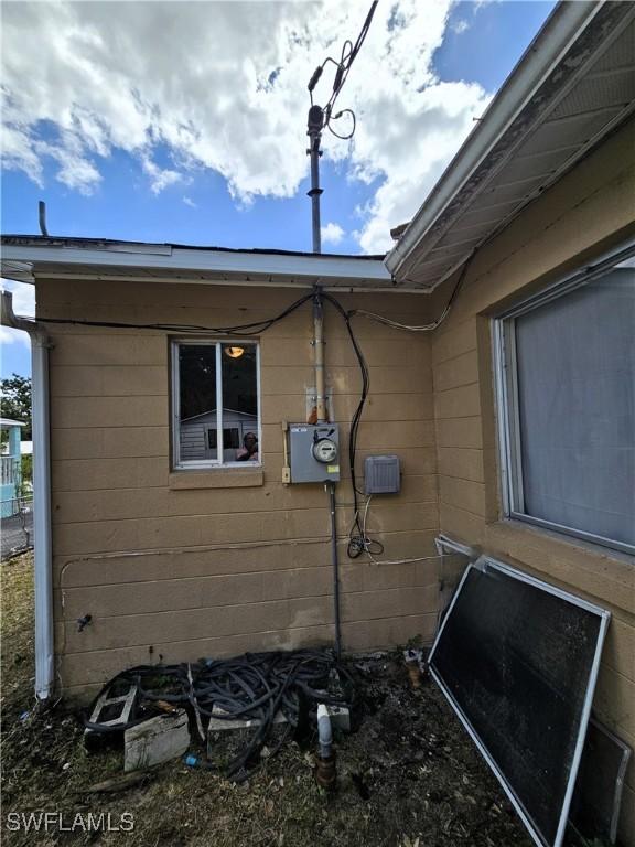 1112 Evanston St, Sebring, FL 33870 - view of property exterior featuring concrete block siding