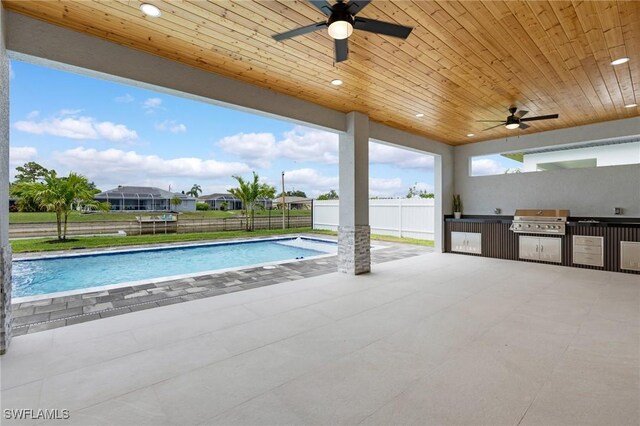 149 SE 21st St, Cape Coral, FL 33990 - view of swimming pool featuring ceiling fan and a patio