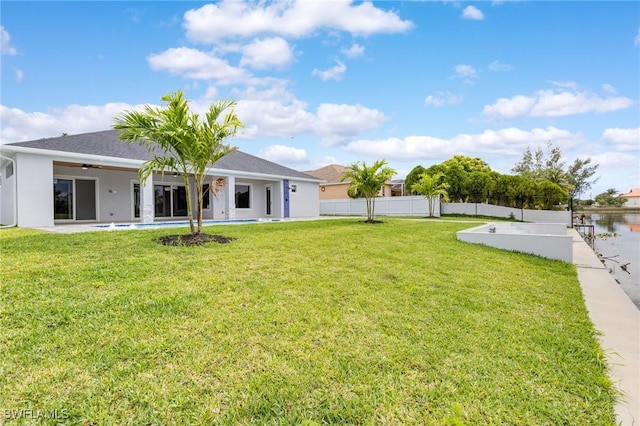 149 SE 21st St, Cape Coral, FL 33990 - view of yard with a ceiling fan and a patio area