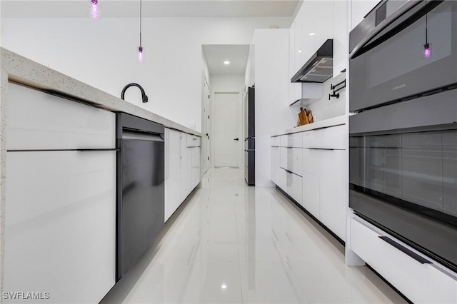 149 SE 21st St, Cape Coral, FL 33990 - kitchen with modern cabinets, white cabinets, hanging light fixtures, under cabinet range hood, and light countertops