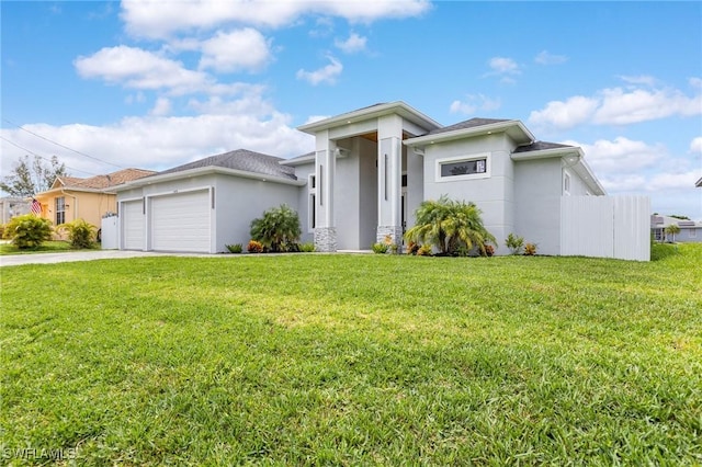 149 SE 21st St, Cape Coral, FL 33990 - prairie-style house with stucco siding, an attached garage, and driveway