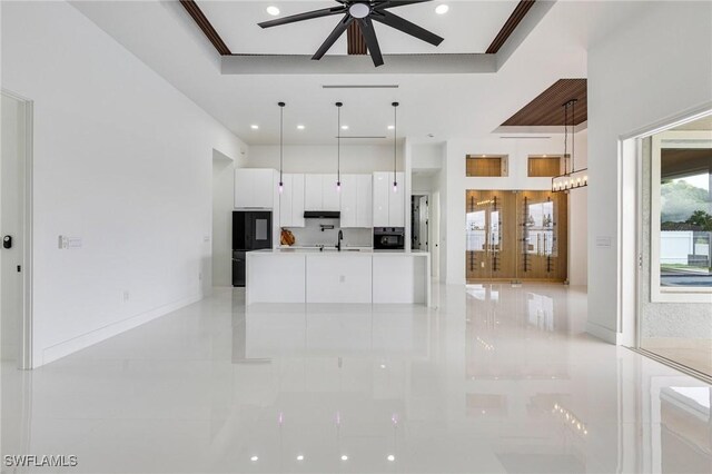 149 SE 21st St, Cape Coral, FL 33990 - unfurnished living room with ceiling fan, light tile patterned floors, recessed lighting, and a sink
