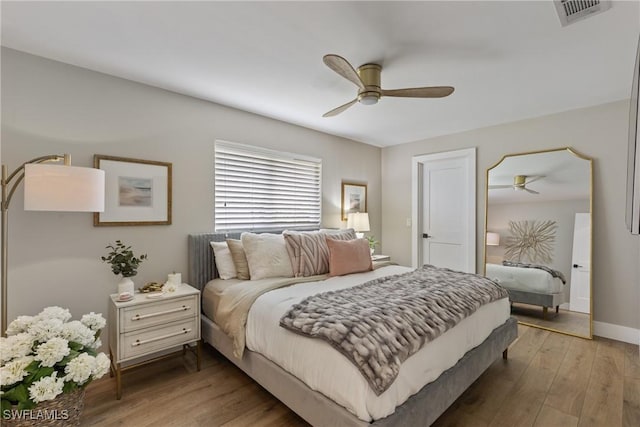 1020 SW 56th St, Cape Coral, FL 33914 - bedroom featuring light wood-type flooring, ceiling fan, and baseboards