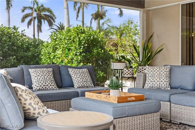 1020 SW 56th St, Cape Coral, FL 33914 - view of patio / terrace featuring an outdoor living space