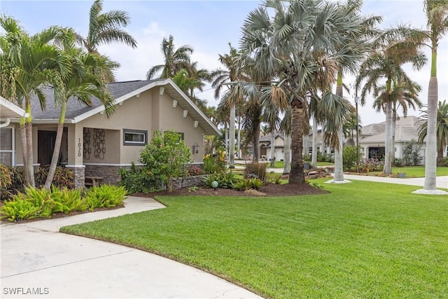 1020 SW 56th St, Cape Coral, FL 33914 - view of green lawn