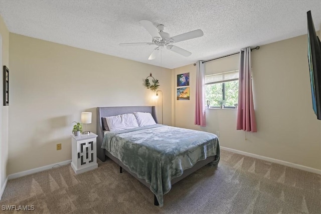 503 Cape Coral Pkwy W Unit 201, Cape Coral, FL 33914 - bedroom featuring carpet flooring, baseboards, ceiling fan, and a textured ceiling