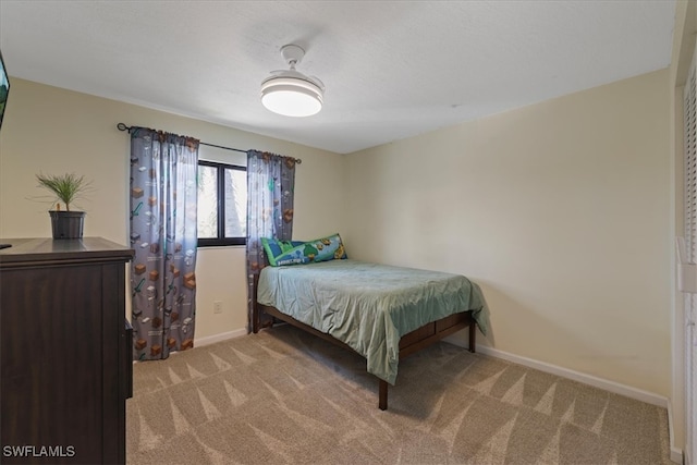 503 Cape Coral Pkwy W Unit 201, Cape Coral, FL 33914 - bedroom featuring light colored carpet and baseboards