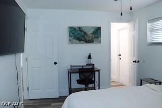 5750 N Andrews Ave, Oakland Park, FL 33309 - bedroom featuring wood finished floors