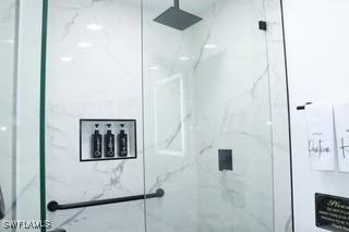 5750 N Andrews Ave, Oakland Park, FL 33309 - full bath with a marble finish shower