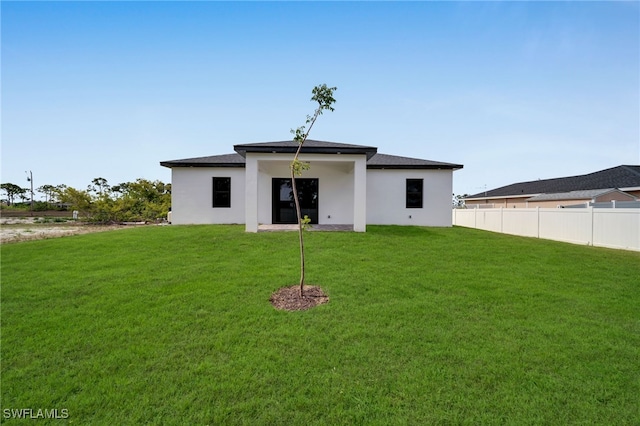 1925 NW 30th Ter, Cape Coral, FL 33993 - rear view of house with stucco siding