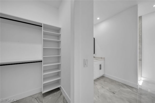 1925 NW 30th Ter, Cape Coral, FL 33993 - spacious closet featuring light marble finish floors