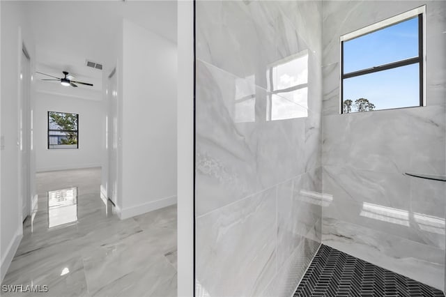 1925 NW 30th Ter, Cape Coral, FL 33993 - full bath featuring a marble finish shower, ceiling fan, marble finish flooring, and baseboards