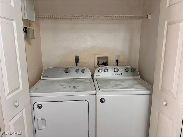 6401 Aragon Way Unit 102, Fort Myers, FL 33966 - laundry room with washing machine and clothes dryer