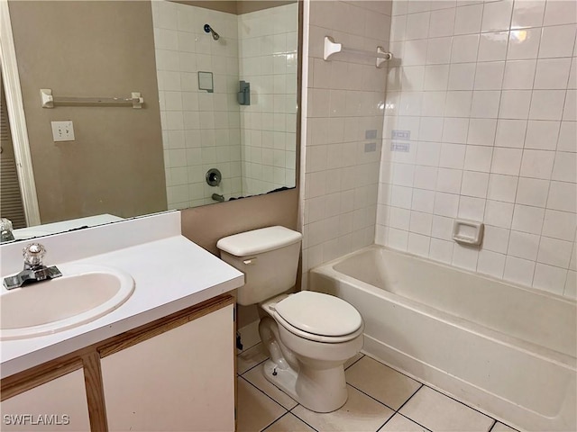6401 Aragon Way Unit 102, Fort Myers, FL 33966 - full bath with tile patterned flooring, vanity, toilet, and bathing tub / shower combination