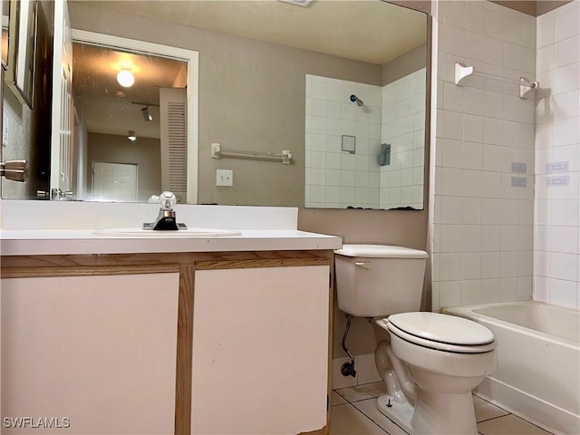 6401 Aragon Way Unit 102, Fort Myers, FL 33966 - full bath with toilet, vanity, tile patterned floors, and bathtub / shower combination
