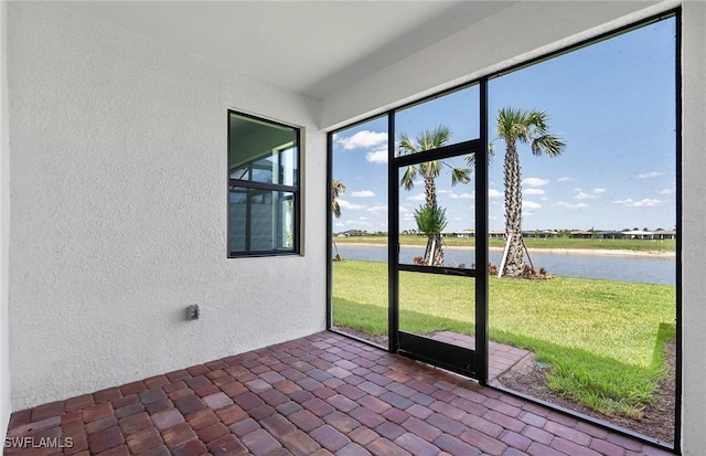 6459 Memorial Ln, Ave Maria, FL 34142 - unfurnished sunroom featuring a water view