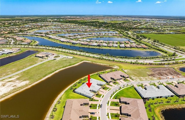 6459 Memorial Ln, Ave Maria, FL 34142 - aerial view of residential area with a large body of water