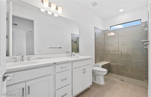 6459 Memorial Ln, Ave Maria, FL 34142 - full bath with a shower stall, double vanity, toilet, and tile patterned flooring