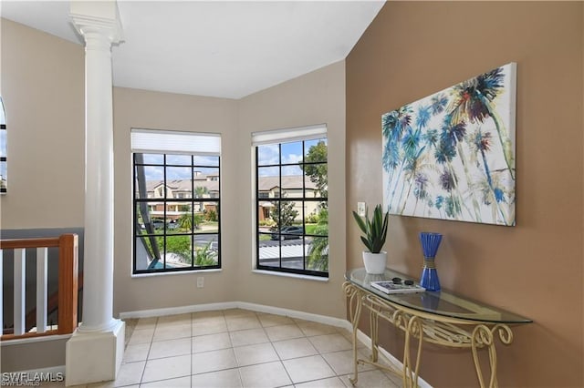 17260 Eagle Trce Unit 10, Fort Myers, FL 33908 - doorway featuring decorative columns, baseboards, and tile patterned flooring
