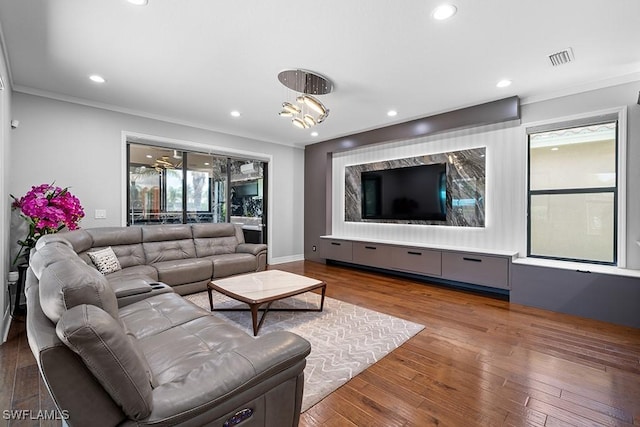 11651 Oakwood Preserve Pl, Fort Myers, FL 33913 - living room with ornamental molding, recessed lighting, wood finished floors, and baseboards