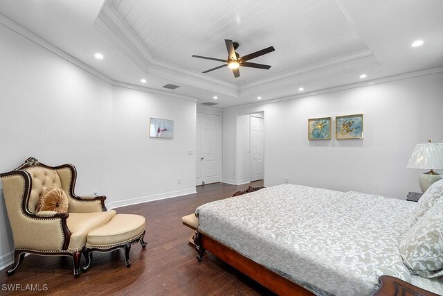 11651 Oakwood Preserve Pl, Fort Myers, FL 33913 - bedroom with a tray ceiling, ornamental molding, wood finished floors, recessed lighting, and baseboards