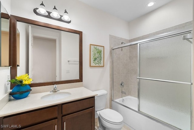 11651 Oakwood Preserve Pl, Fort Myers, FL 33913 - bathroom featuring toilet, vanity, enclosed tub / shower combo, and recessed lighting