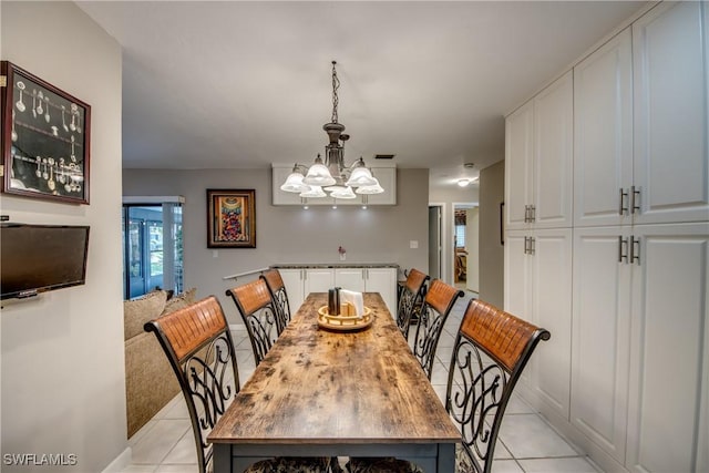 7116 Blanquilla Ct Unit 220, Fort Myers, FL 33908 - dining area with light tile patterned flooring and a chandelier