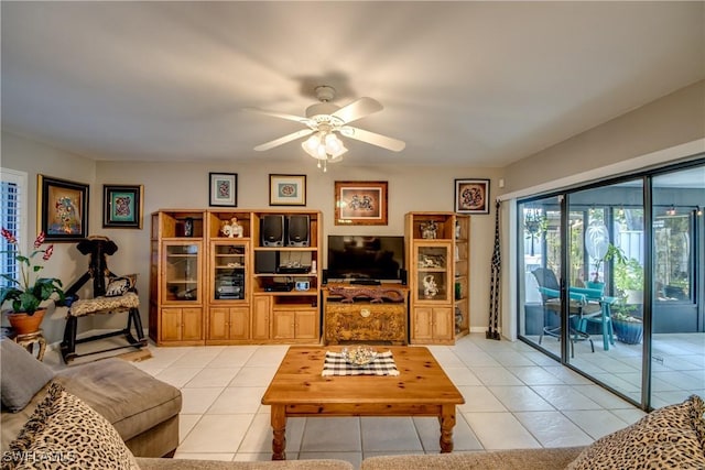 7116 Blanquilla Ct Unit 220, Fort Myers, FL 33908 - living area with light tile patterned floors and a ceiling fan