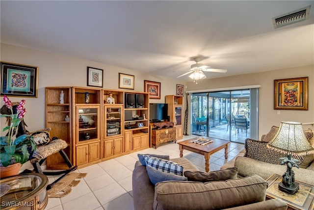7116 Blanquilla Ct Unit 220, Fort Myers, FL 33908 - living area with light tile patterned floors and ceiling fan