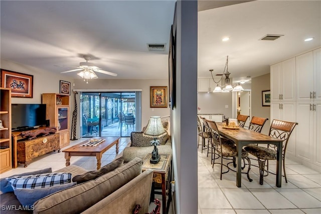 7116 Blanquilla Ct Unit 220, Fort Myers, FL 33908 - living area with light tile patterned floors, ceiling fan, a chandelier, and recessed lighting