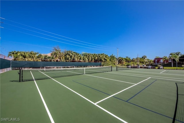 7116 Blanquilla Ct Unit 220, Fort Myers, FL 33908 - view of tennis court with community basketball court