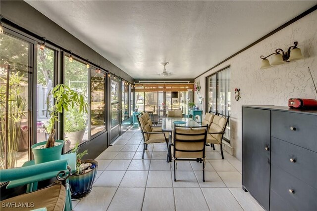 7116 Blanquilla Ct Unit 220, Fort Myers, FL 33908 - sunroom / solarium with tile patterned floors and a textured ceiling