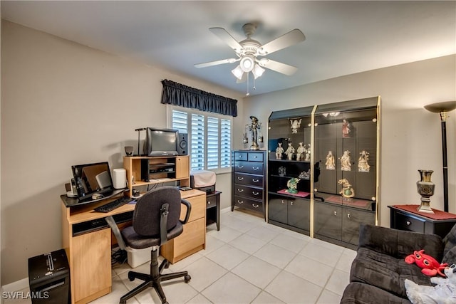 7116 Blanquilla Ct Unit 220, Fort Myers, FL 33908 - home office with a ceiling fan and light tile patterned flooring