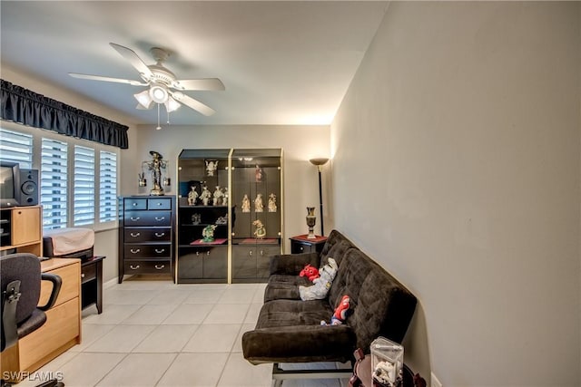 7116 Blanquilla Ct Unit 220, Fort Myers, FL 33908 - living area featuring ceiling fan, light tile patterned flooring, an office area, and baseboards