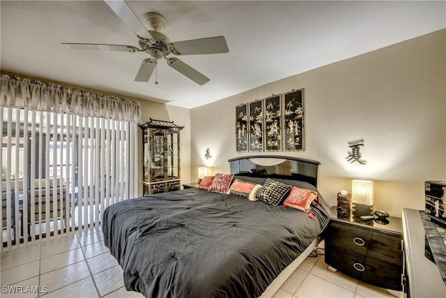 7116 Blanquilla Ct Unit 220, Fort Myers, FL 33908 - tiled bedroom with ceiling fan and access to outside
