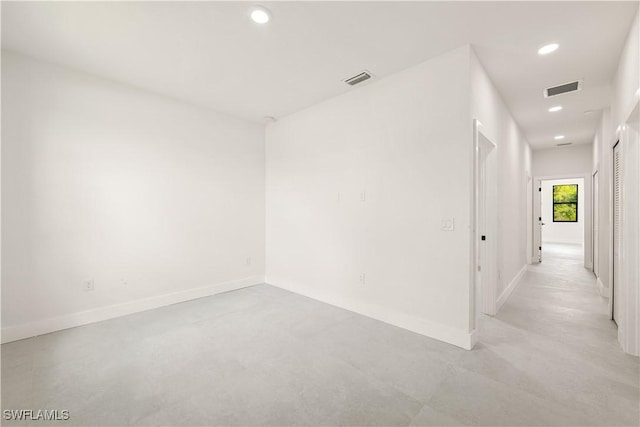 3001 25th St W, Lehigh Acres, FL 33971 - unfurnished room with recessed lighting, baseboards, and concrete floors