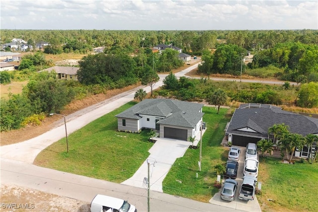 3001 25th St W, Lehigh Acres, FL 33971 - drone / aerial view of a heavily wooded area