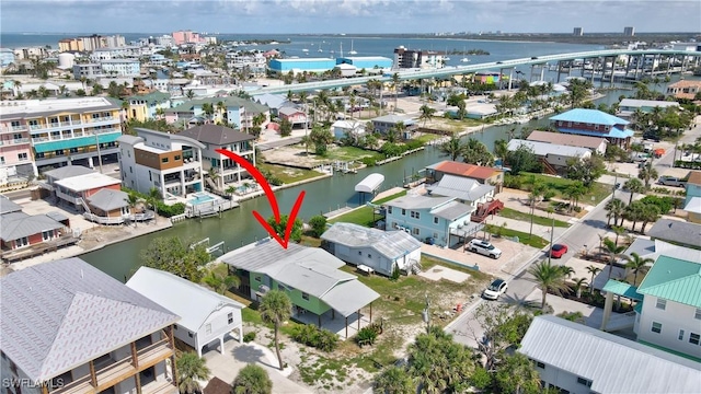 171 Primo Dr, Fort Myers Beach, FL 33931 - aerial view of residential area featuring a nearby body of water and a notable bridge