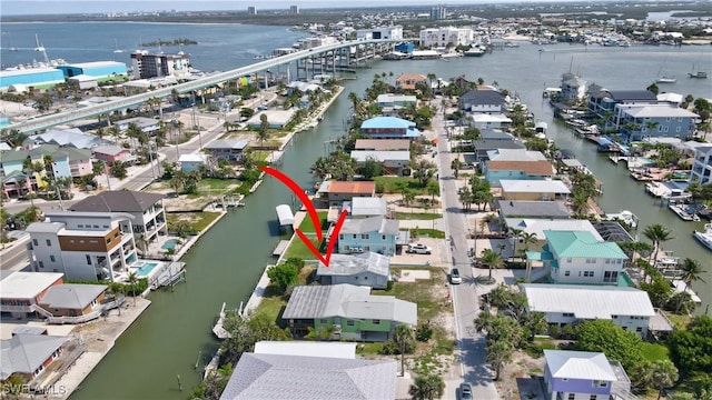 171 Primo Dr, Fort Myers Beach, FL 33931 - aerial perspective of suburban area with a large body of water