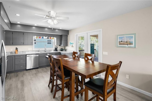 171 Primo Dr, Fort Myers Beach, FL 33931 - dining area with light wood-type flooring, a ceiling fan, recessed lighting, and baseboards