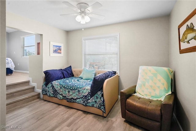 171 Primo Dr, Fort Myers Beach, FL 33931 - bedroom featuring wood finished floors, ceiling fan, and baseboards