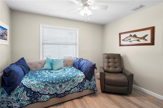 171 Primo Dr, Fort Myers Beach, FL 33931 - bedroom featuring wood finished floors, baseboards, and a ceiling fan