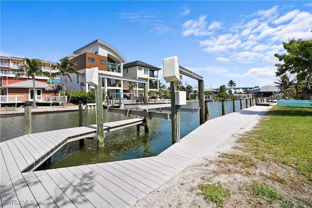 171 Primo Dr, Fort Myers Beach, FL 33931 - dock featuring boat lift and a water view