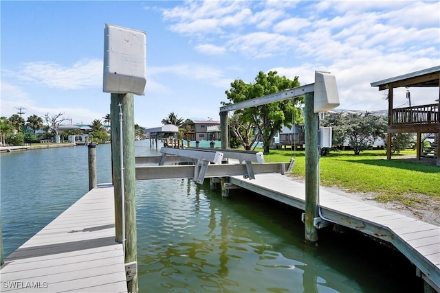 171 Primo Dr, Fort Myers Beach, FL 33931 - dock featuring a water view and a yard