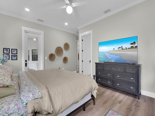 16970 Laurelin Ct, North Fort Myers, FL 33917 - bedroom with ornamental molding, light wood finished floors, recessed lighting, ceiling fan, and baseboards